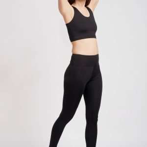 sustainable black tankini and black surf & yoga leggings - sustainable activewear
